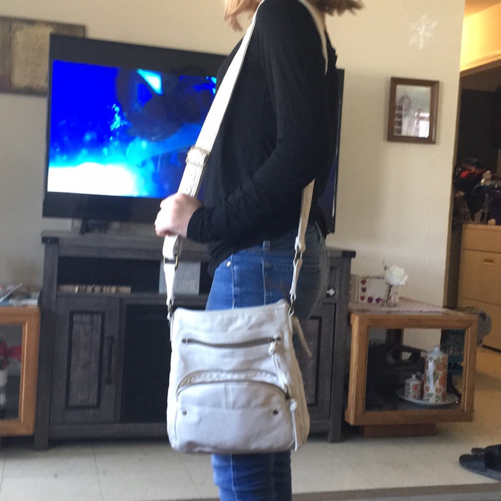 Nice clean off white purse